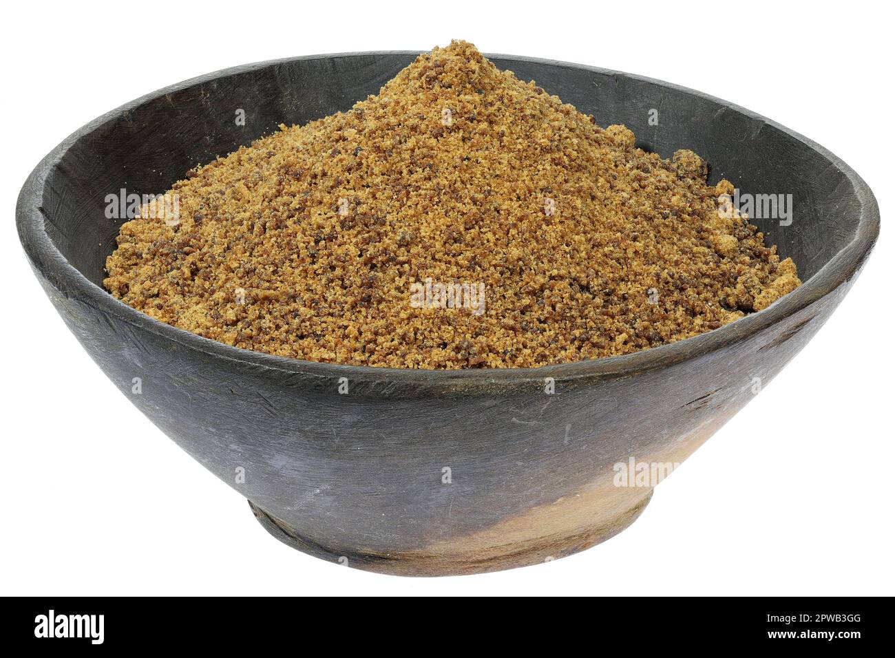palm sugar in a wooden bowl isolated on white background Stock Photo