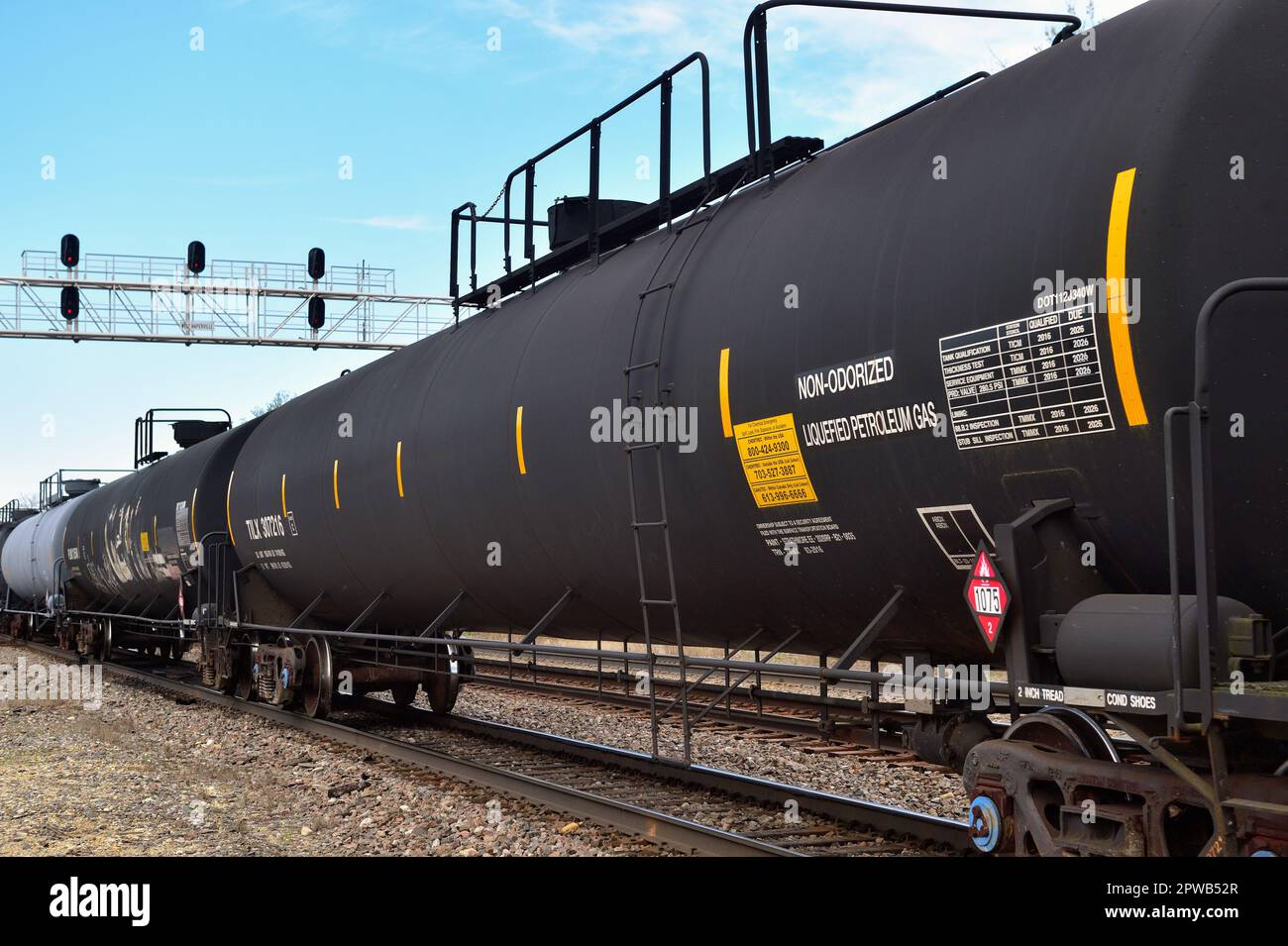 Naperville, Illinois, USA. A string of tank cars in a freight train passing through northeastern Illinois. Stock Photo