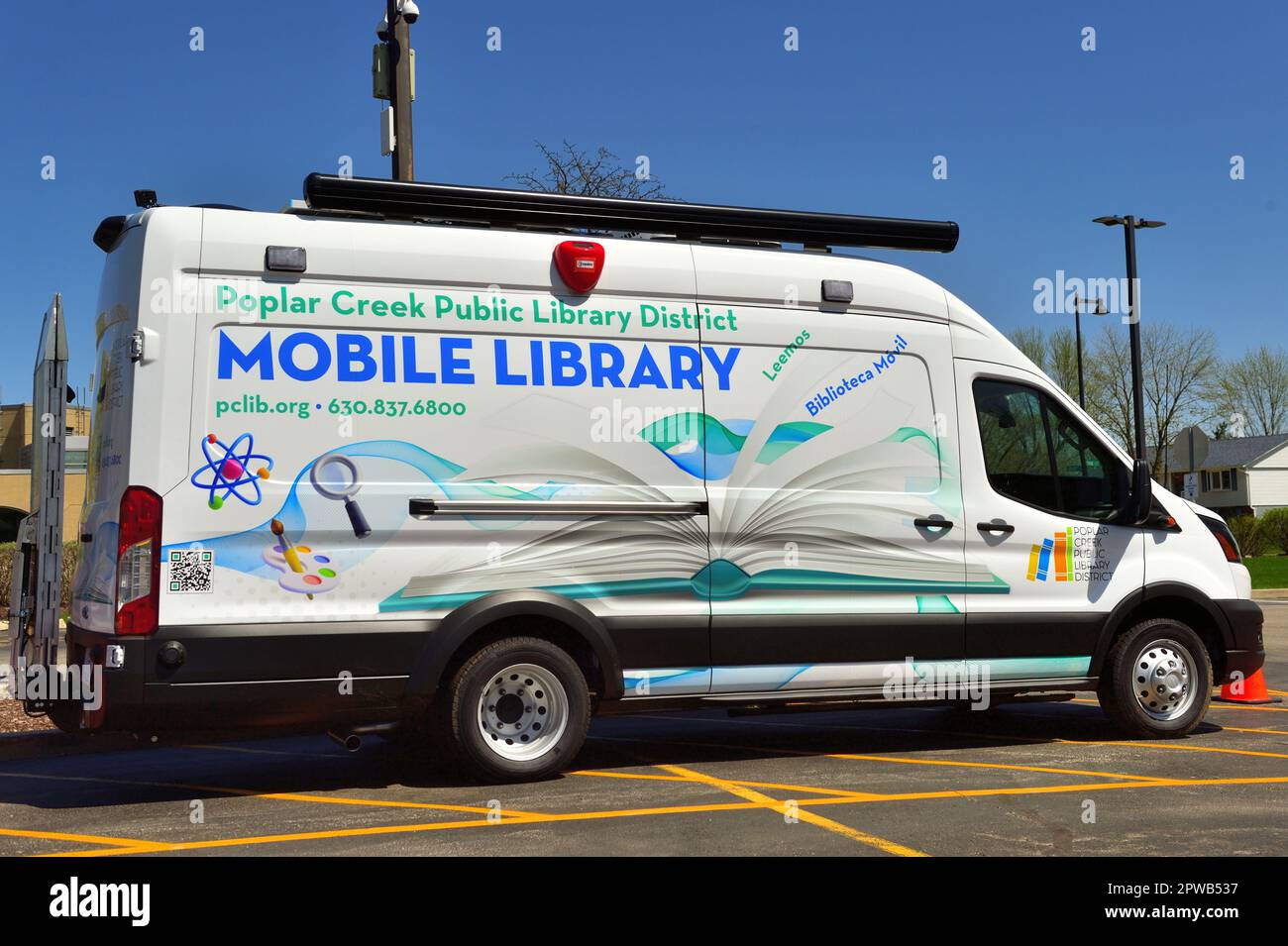 Streamwood, Illinois, USA. A mobile library vehicle in a library parking lot awaiting its next traveling assignment in the community. Stock Photo