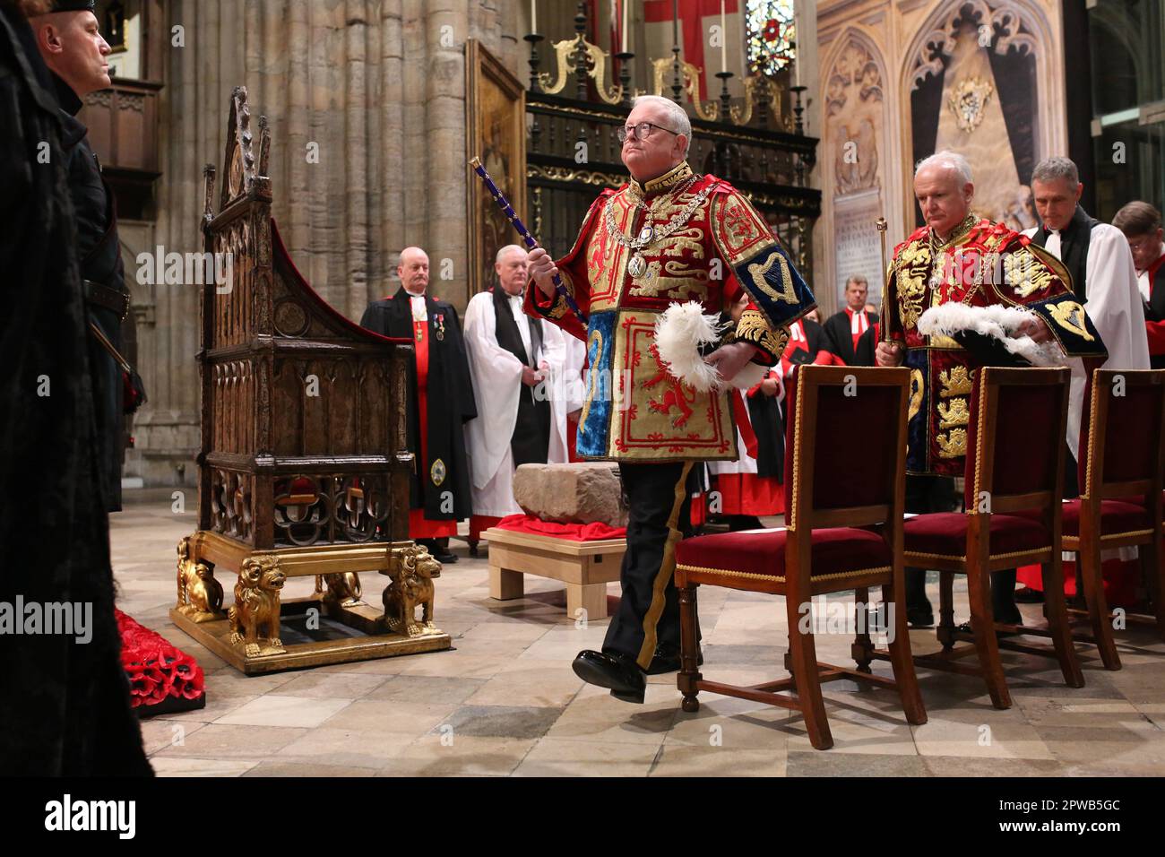 The Lord Lyon King of Arms, Joseph Morrow, arrives for a service to