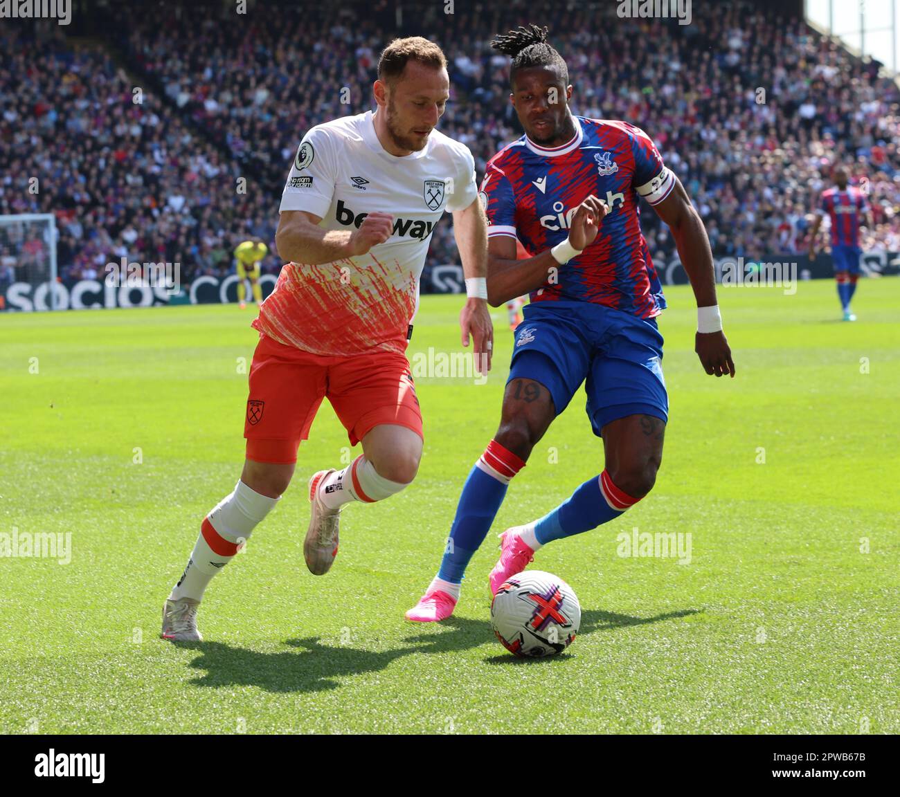 London, UK. 29th Apr, 2023. L-R West Ham United's Jarrod Bowen and Crystal Palace's Wilfried Zaha during English Premier League soccer match between Crystal Palace against West Ham United at Selhurst Park, London on 29th April, 2023 Credit: Action Foto Sport/Alamy Live News Stock Photo