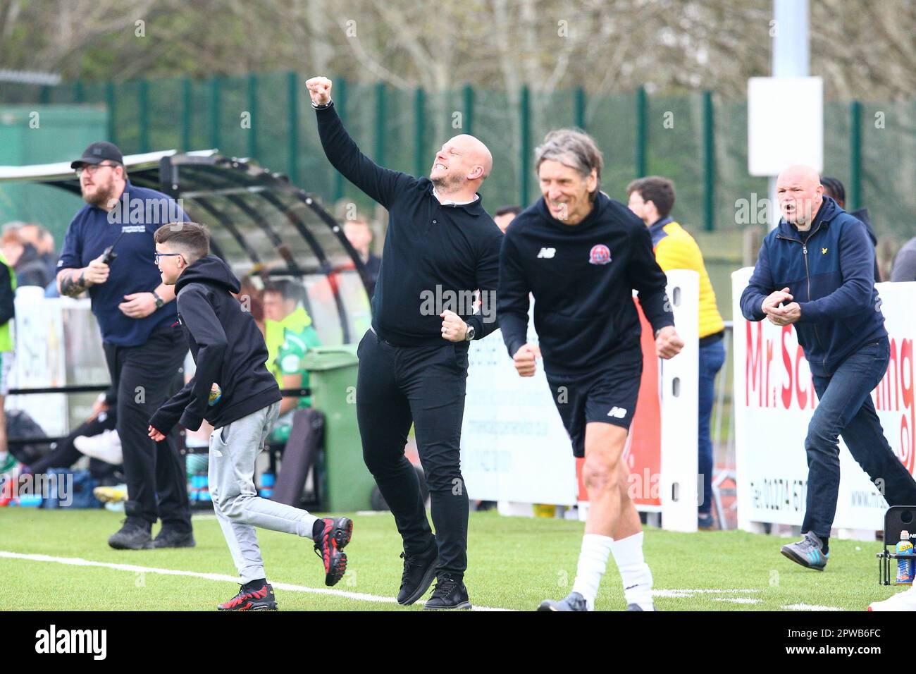 Horsfall Community Stadium, Bradford, England - 29th April 2023 Adam Murray Manager of AFC Fylde fist pumps after the final whistle as his team won the league as champions  - during the game Bradford Park Avenue v AFC Fylde, Vanarama National League North,  2022/23, Horsfall Community Stadium, Bradford, England - 29th April 2023 Credit: Arthur Haigh/WhiteRosePhotos/Alamy Live News Stock Photo