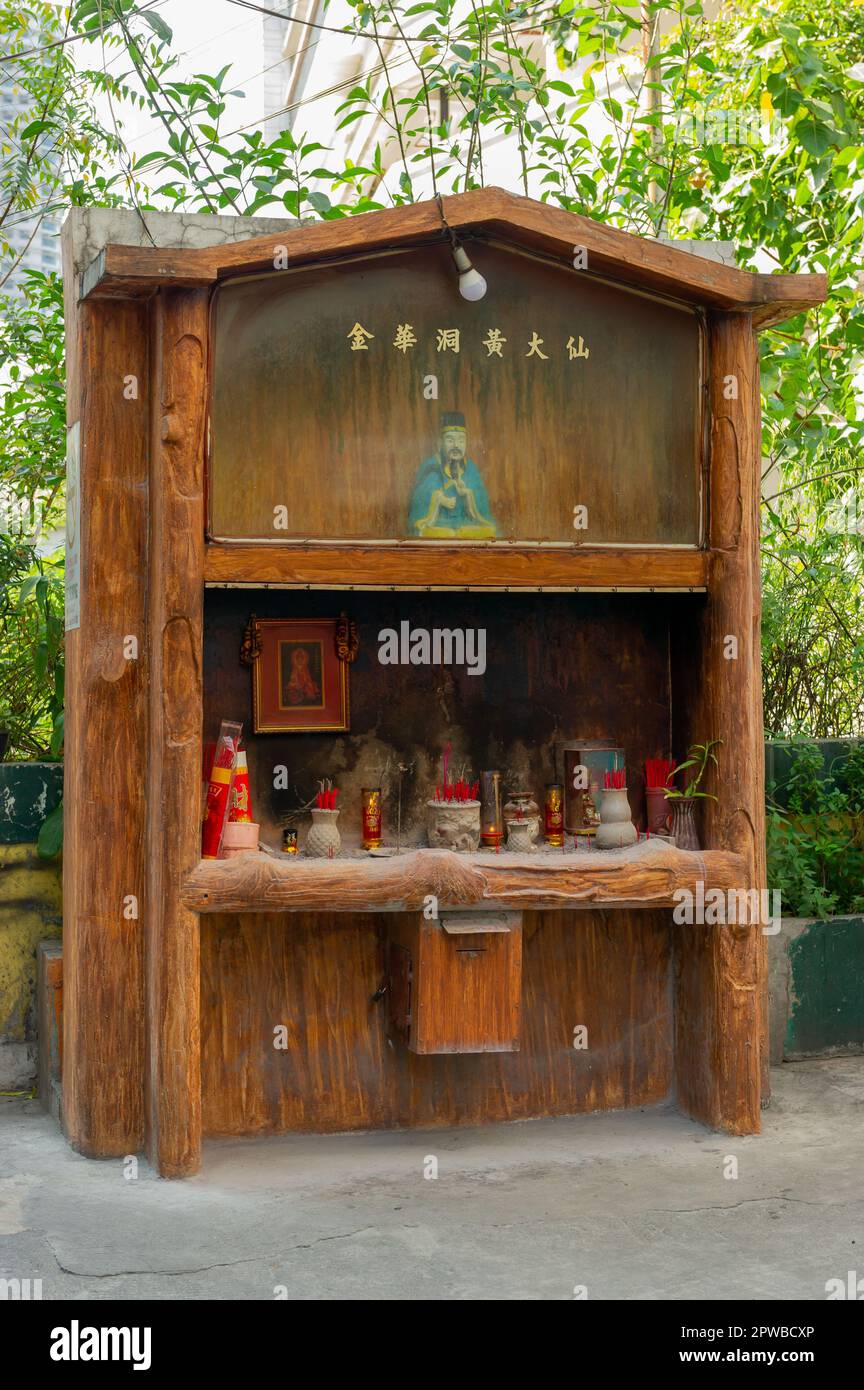 A Buddhist street shrine in Manila, The Philippines Stock Photo