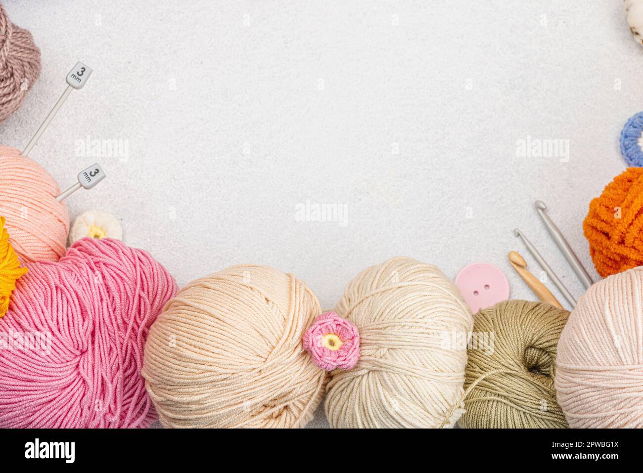 A set of colorful clew of thread for knitting and special craft tools ...