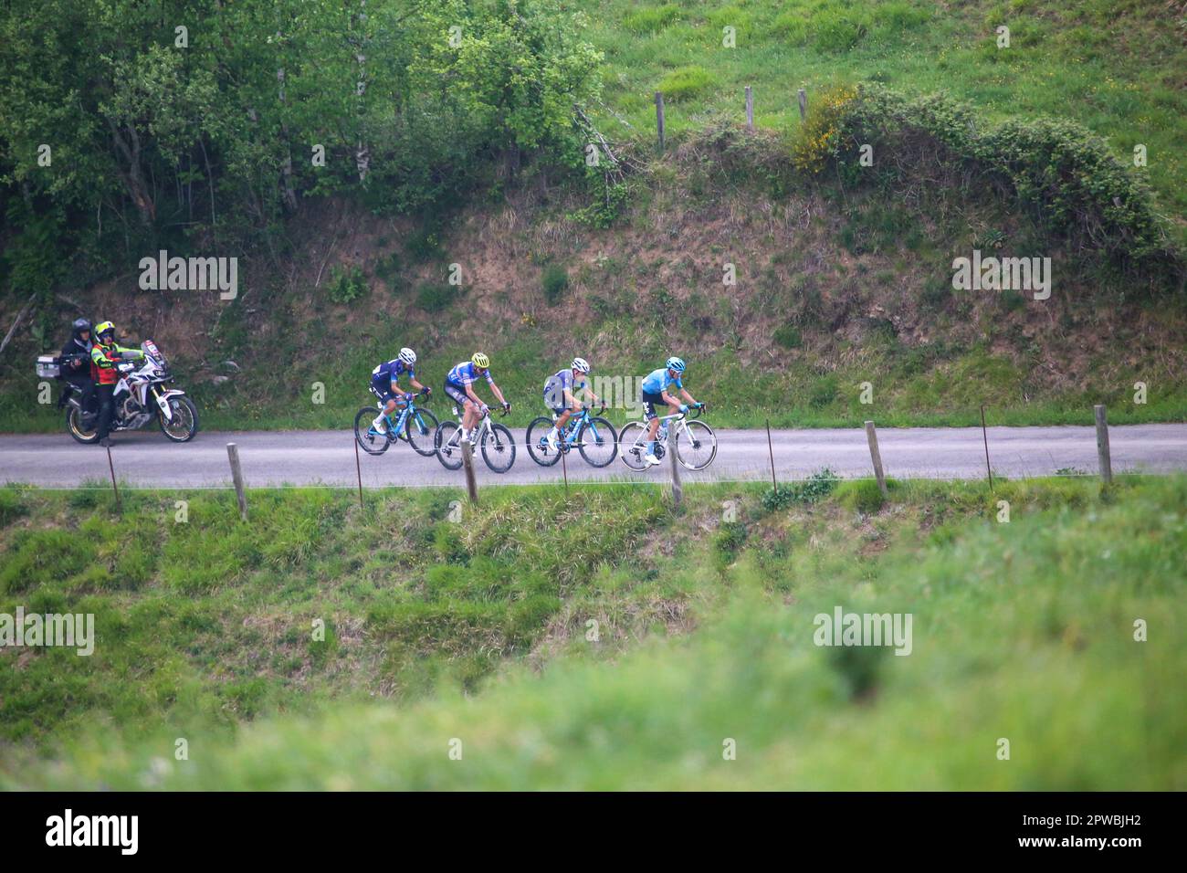 Las Tiendas, Spain, 29th April, 2023: The group of favorites pulled by Lorenzo Fortunato (EOLO-Kometa, R), followed by Einer Augusto Rubio (Movistar Team, 2R), the blue jersey of leader, Damien Howson (Q36.5 Pro Cycling Team, 2L) and Ivan Ramiro Sosa (Movistar Team, L) during the 2nd stage of the Vuelta a Asturias 2023 between Candas and Cangas del Narcea, on April 29, 2023, in Las Tiendas, Spain. Credit: Alberto Brevers / Alamy Live News Stock Photo