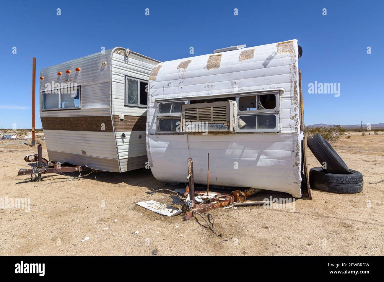 Two trailer homes sit abandoned in the high Mojave desert in Hi Vista