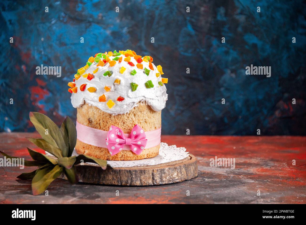 front view delicious easter cake with white cream and dried fruits on dark background spring dessert sweet pie bake ornate concept Stock Photo