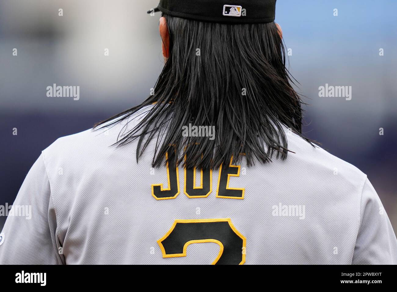 Pittsburgh Pirates' Connor Joe walks in the dugout before a