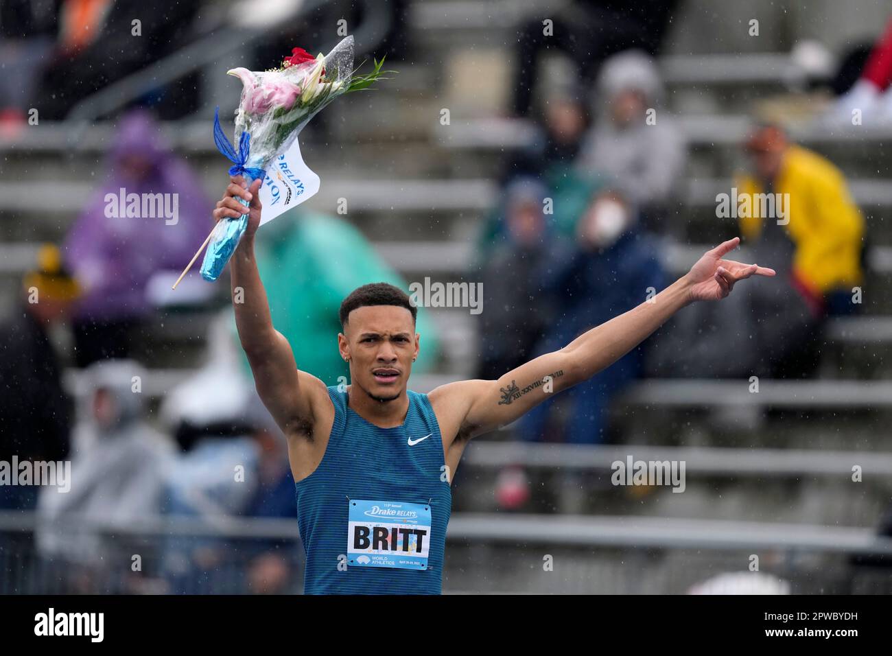 Jamal Britt celebrates after winning the invitational men's 110meter