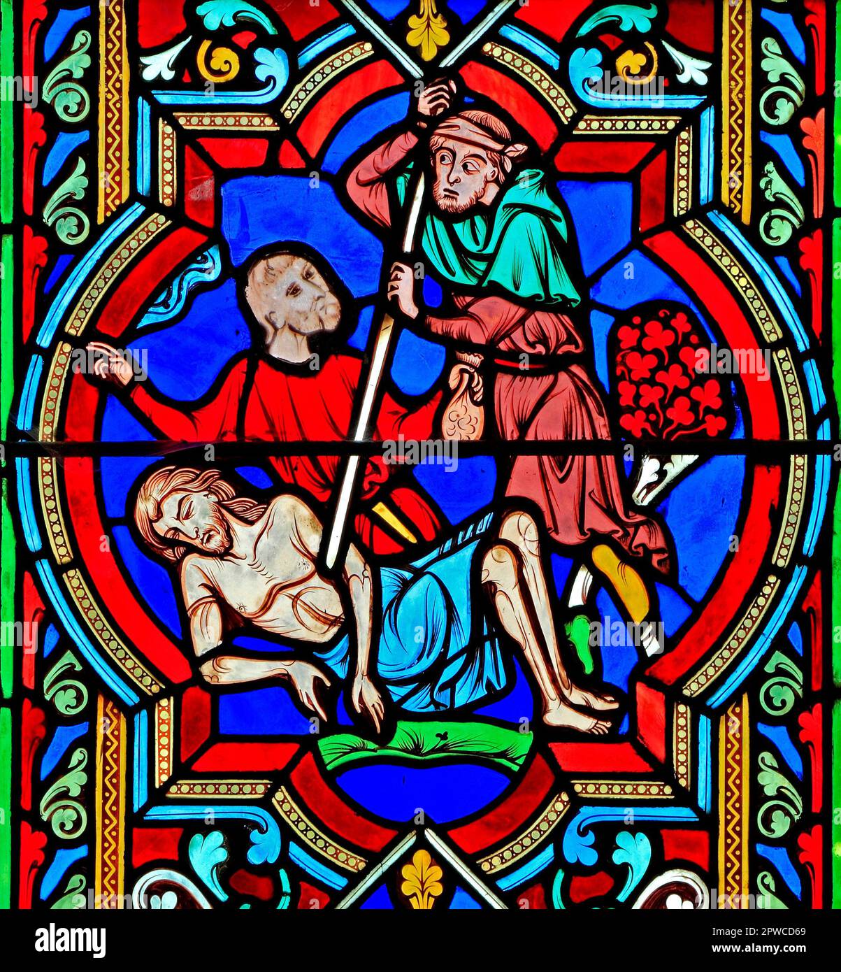 The Good Samaritan Parable, traveller stripped, beaten, left for dead on roadside, stained glass window, by Oudinot of Paris, 1859, Feltwell, Norfolk Stock Photo