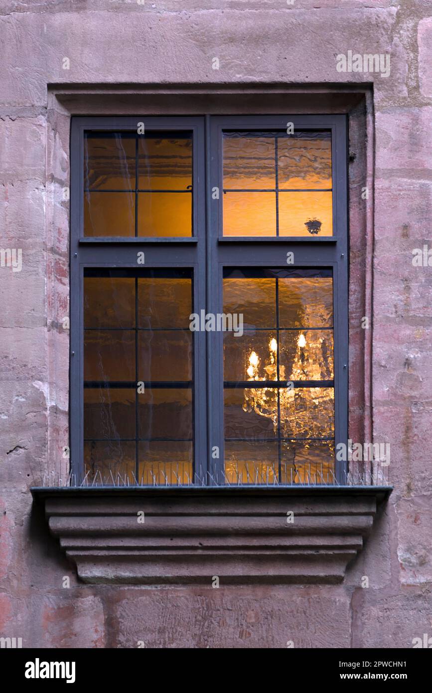 Brightly lit window of the historic Fembohaus, former patrician house, now museum, Nuremberg, Middle Franconia, Bavaria, Germany Stock Photo