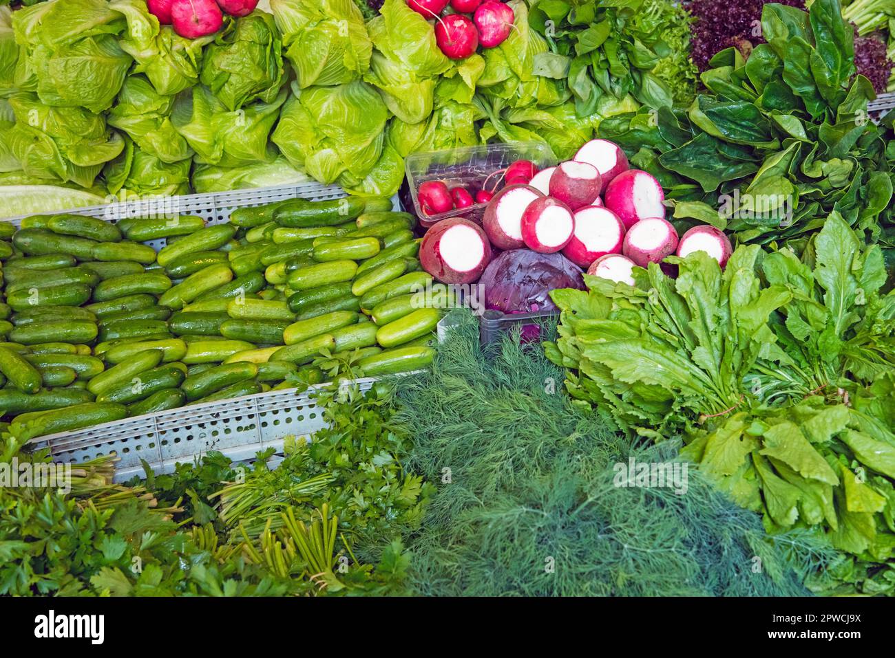 Herbs and salad for sale at a market Stock Photo