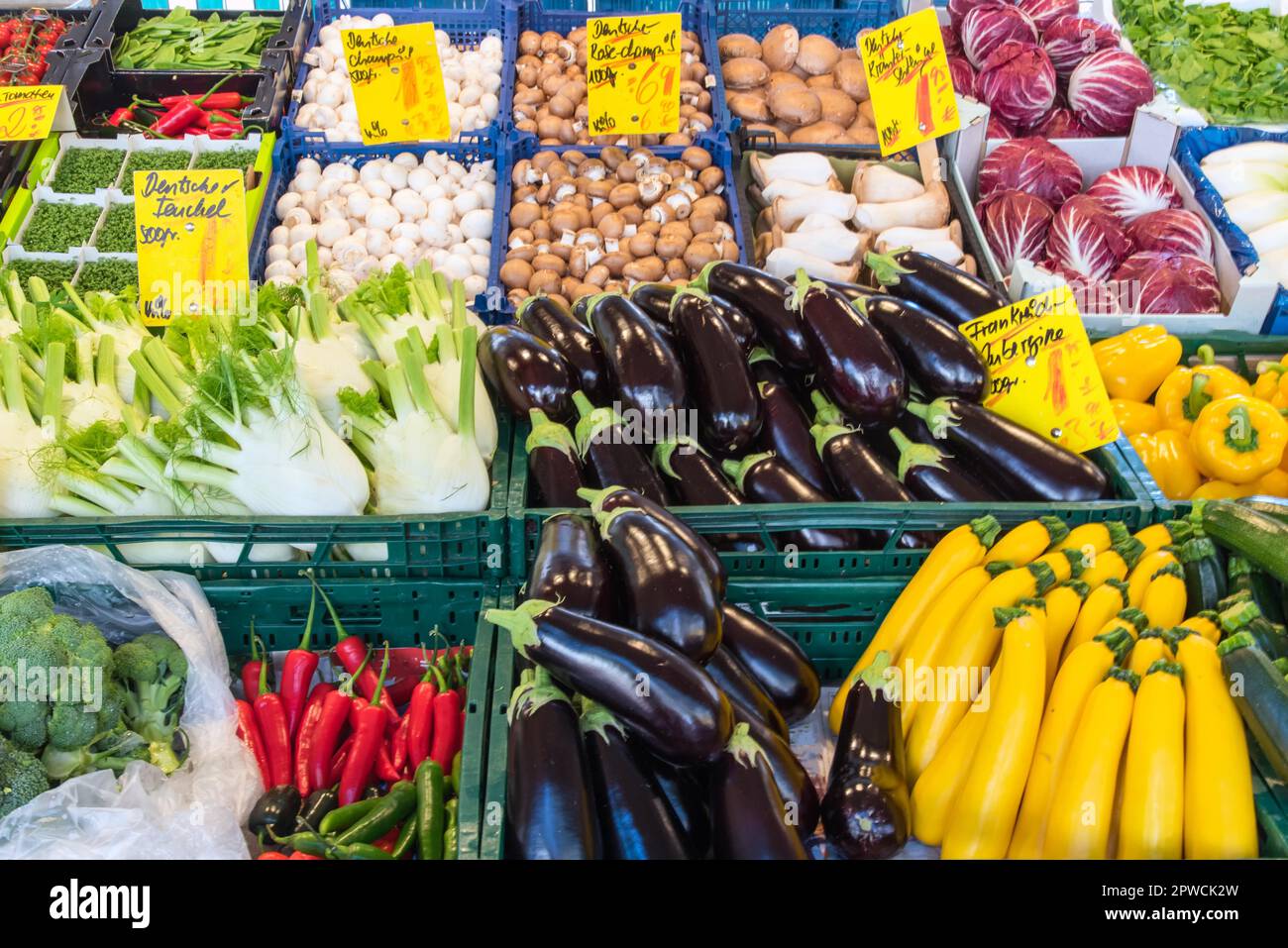 Large selection of vegetables for sale at a market Stock Photo - Alamy