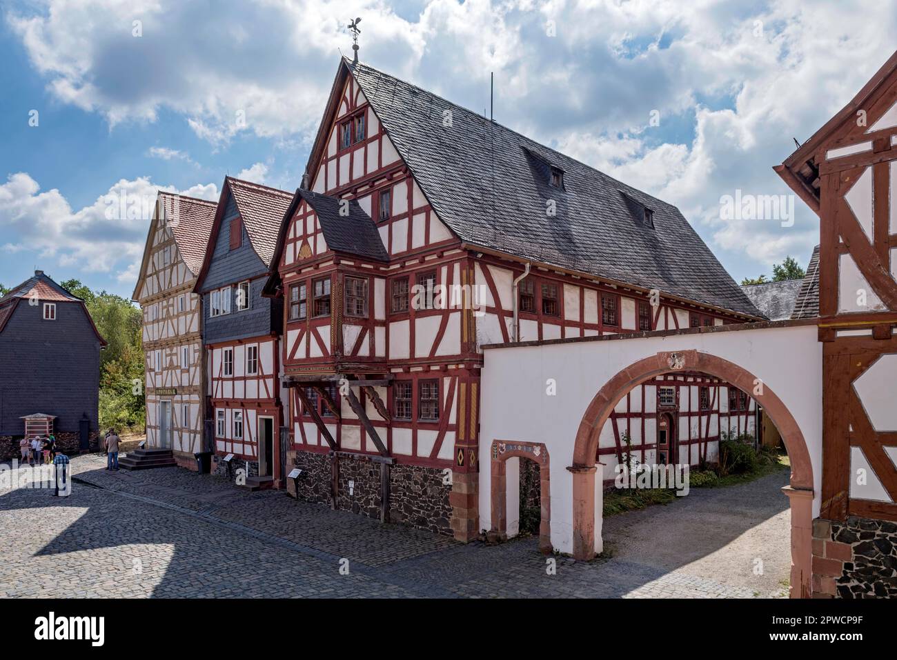 Official residence from Hungen, historic half-timbered house, courtyard with gateway, Hessenpark Open-Air Museum, Neu-Anspach, Taunus, Hesse, Germany Stock Photo