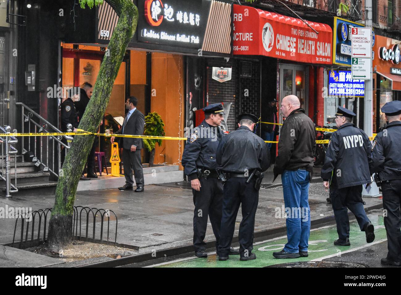 Manhattan, United States. 29th Apr, 2023. A man and police officers seen during the investigation. Police investigate the shooting incident. Shooting in Manhattan, New York, United States on April 29, 2023. At 17:43 Saturday evening one person was shot in the hip and shoulder near the area of 9th Avenue and West 46th Street. According to the New York City Police Department, the person shot is in stable condition. No suspects are captured at this time. (Photo by Kyle Mazza/SOPA Images/Sipa USA) Credit: Sipa USA/Alamy Live News Stock Photo