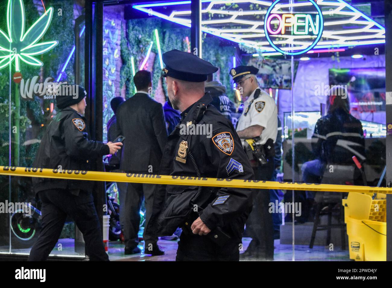 Manhattan, United States. 29th Apr, 2023. Police officers seen during the investigation. Police investigate the shooting incident. Shooting in Manhattan, New York, United States on April 29, 2023. At 17:43 Saturday evening one person was shot in the hip and shoulder near the area of 9th Avenue and West 46th Street. According to the New York City Police Department, the person shot is in stable condition. No suspects are captured at this time. (Photo by Kyle Mazza/SOPA Images/Sipa USA) Credit: Sipa USA/Alamy Live News Stock Photo