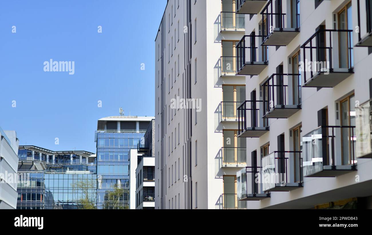 Modern apartment buildings on a sunny day with a blue sky. Facade of a ...