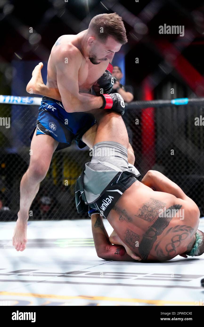 LAS VEGAS, NV - April 29: (L-R) Cody Durden controls the body of Charles  Johnson fight in a Flyweight bout at UFC Apex for UFC Fight Night - Song v  Simon on