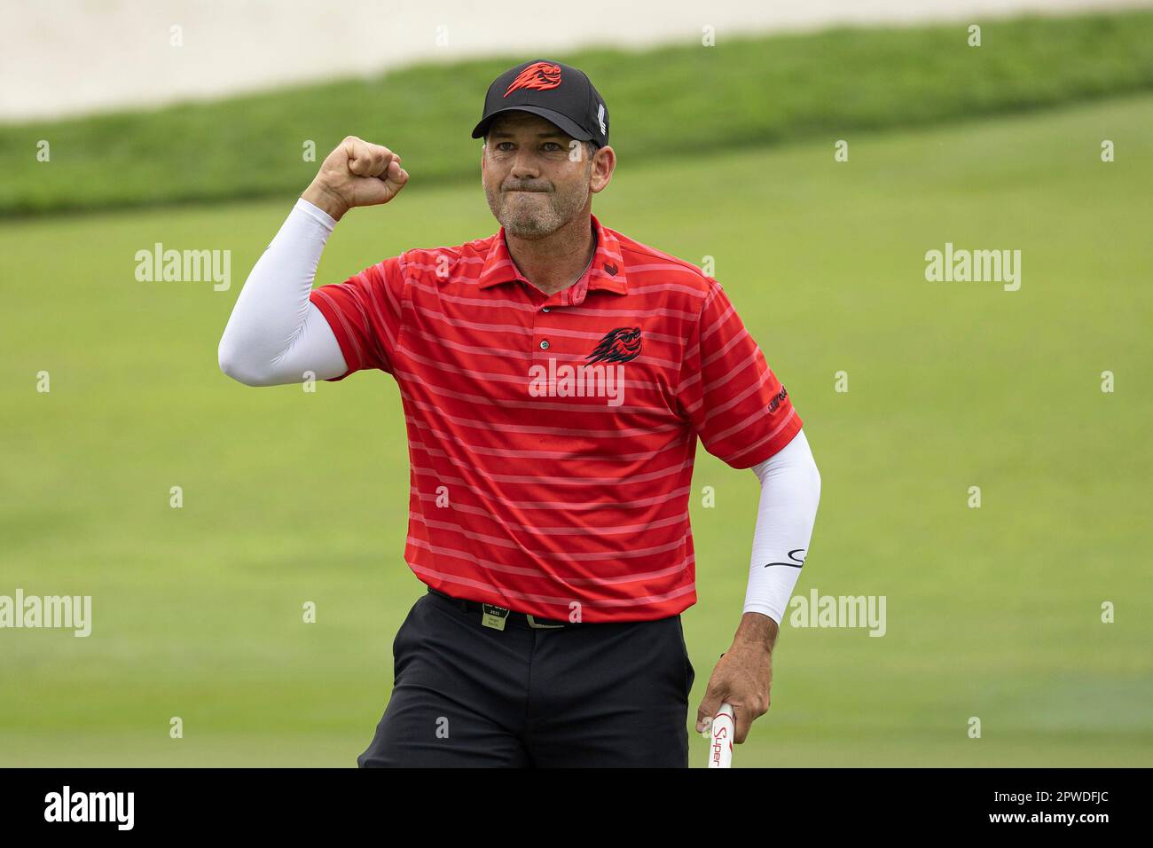 Captain Sergio Garcia of Fireballs GC reacts after making his putt on ...
