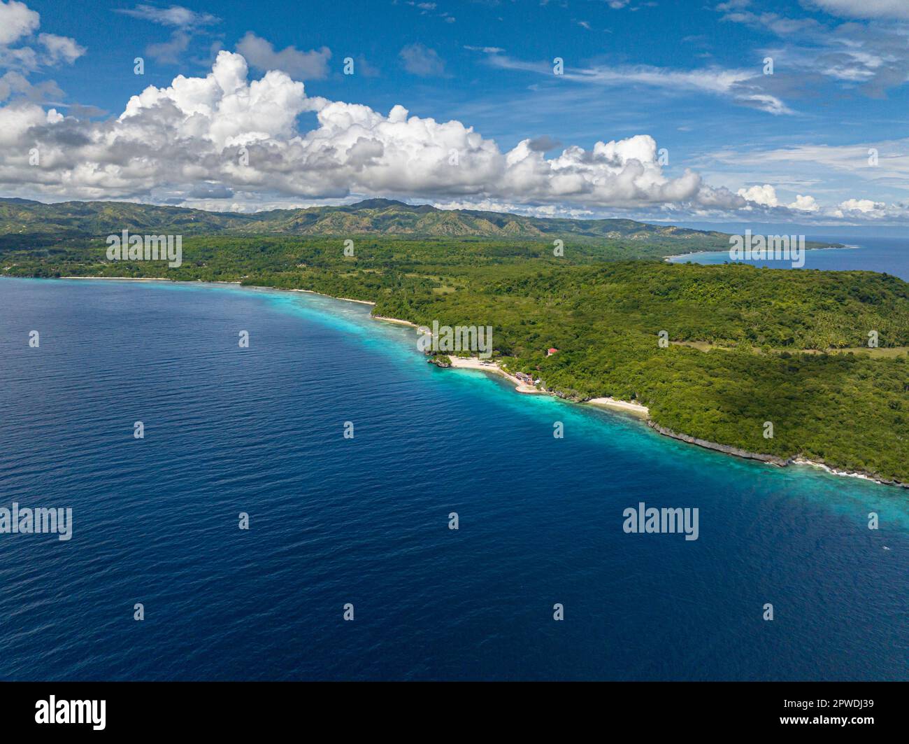 Birds eye view shot of Paradise looks of Siquijor Island under the clear blue skies. Siquijor, Philippines. Stock Photo