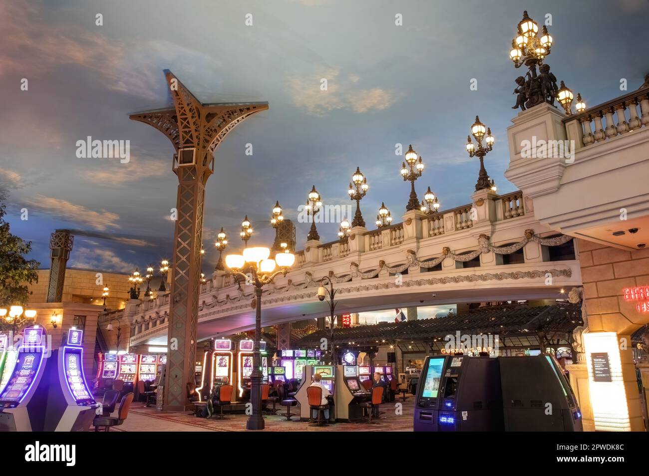 Picture/Photo: Man and woman standing on plaza inside Paris casino. Las  Vegas, Nevada, USA