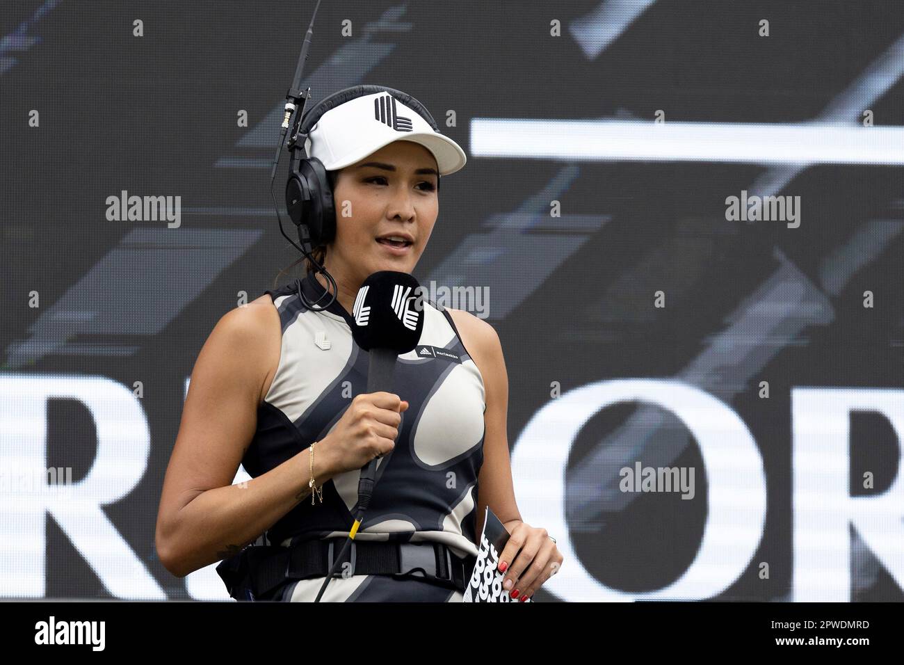 LIV Golf Broadcaster, Su-Ann Heng, speaks during the trophy ceremony of