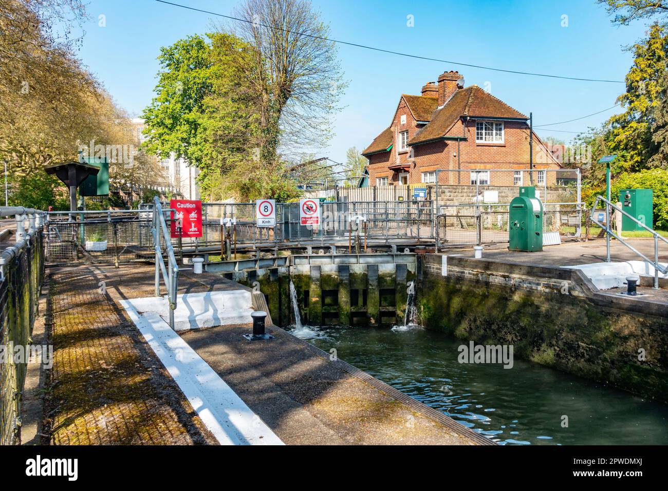 The gates of Caversham Lock hold back water on The River Thames at