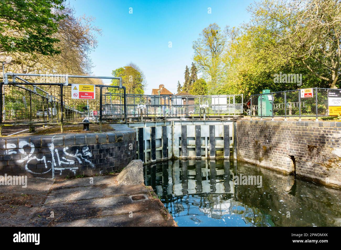 The gates of Caversham Lock hold back water on The River Thames at