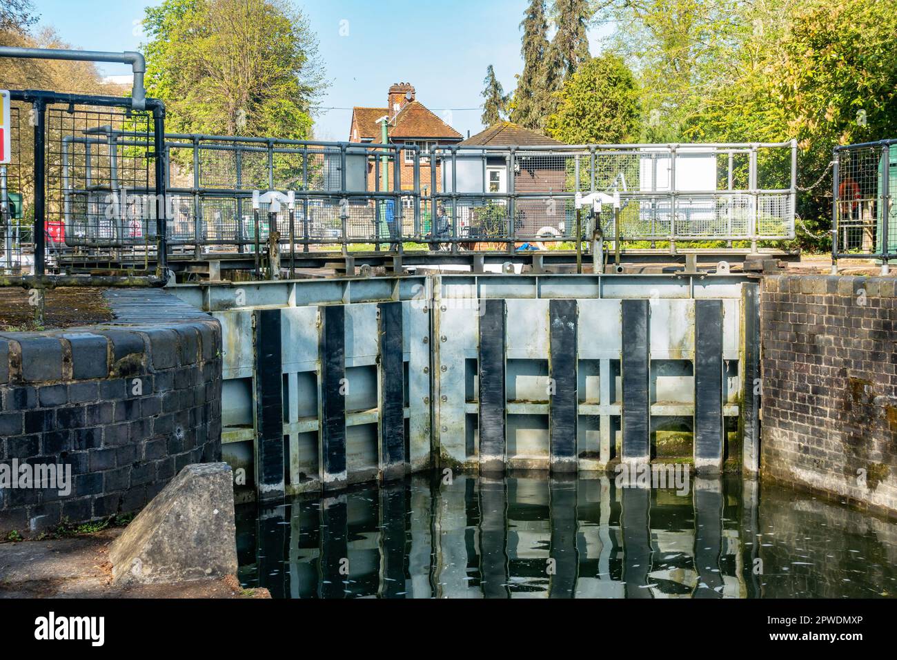 The gates of Caversham Lock hold back water on The River Thames at