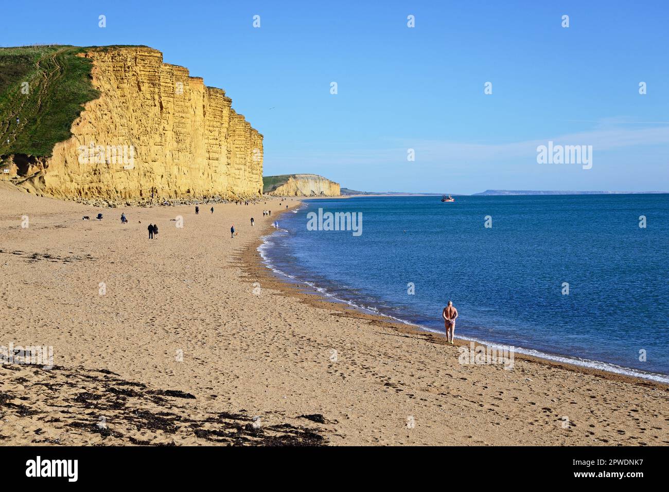 View along the beach and Jurassic Coast coastline, West Bay, Dorset, UK, Europe. Stock Photo
