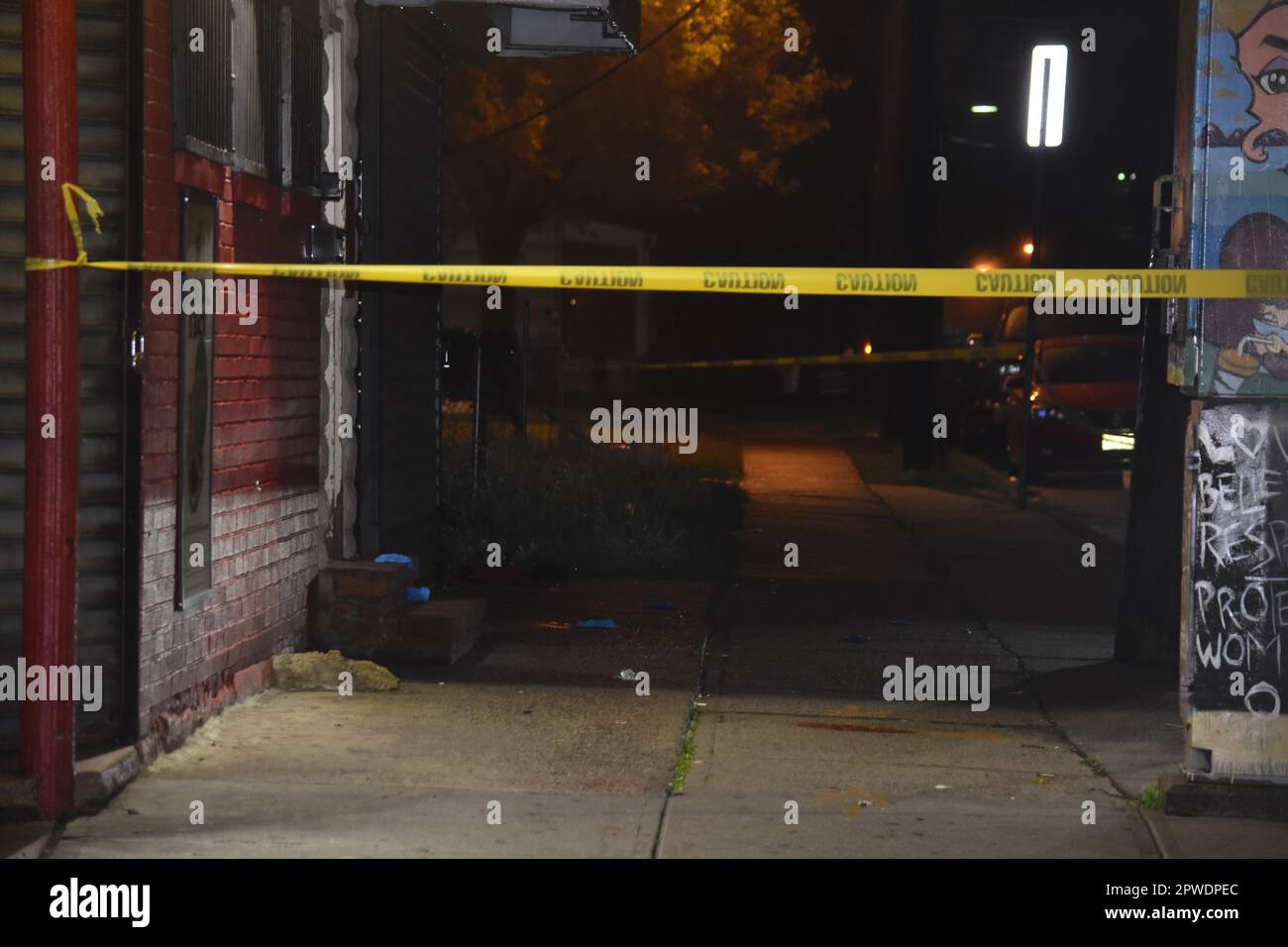 Gloves and blood litter the crime scene. Evidence shown was protected