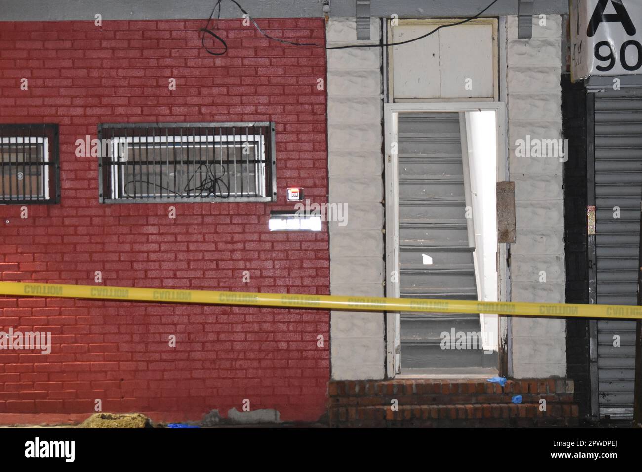 Gloves and blood litter the crime scene. Evidence shown was protected