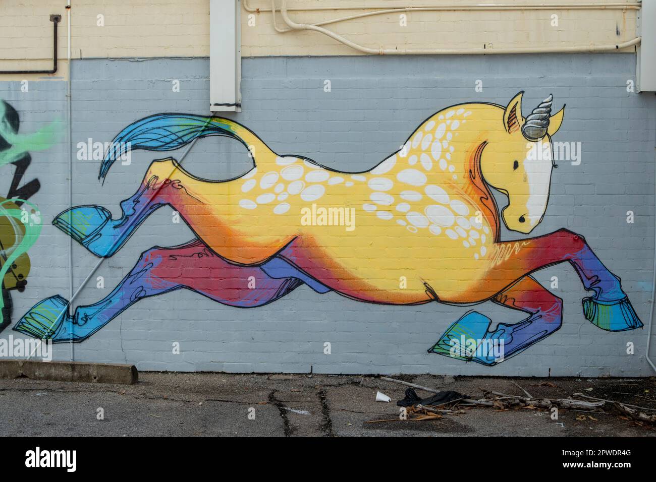 Galloping Unicorn Street Art by Kaff-eine, Darwin, NT, Australia Stock Photo
