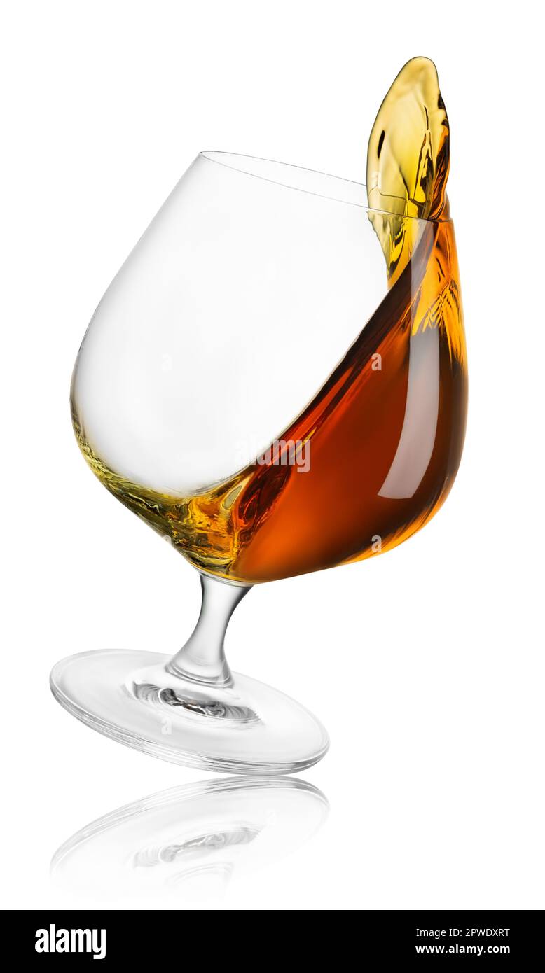falling glass of brandy with splash isolated on white Stock Photo Alamy