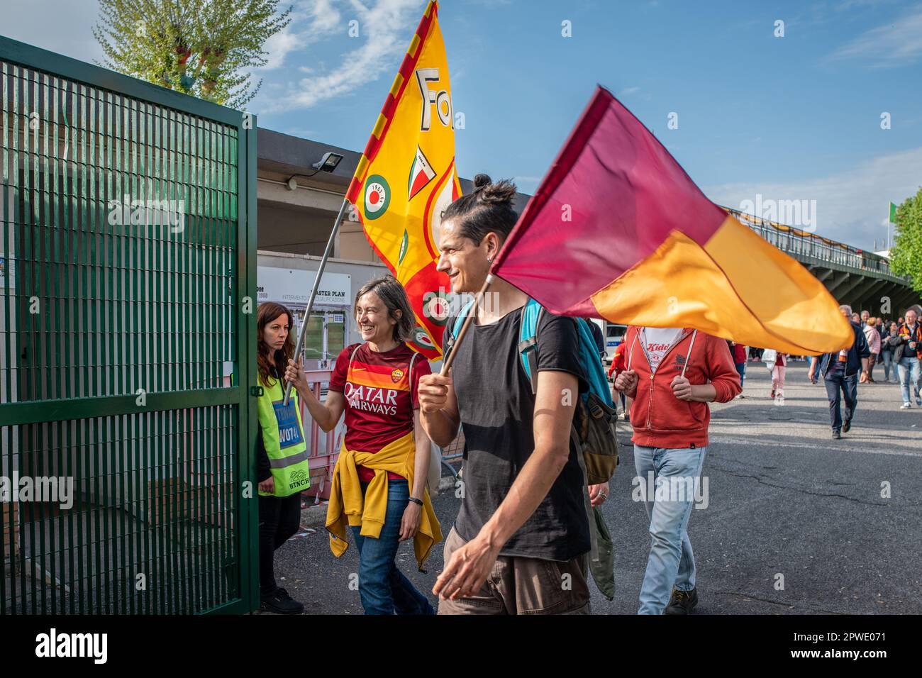 Rome, Italy. 29th Apr, 2023. A smiling boy and girl walk out of the ...