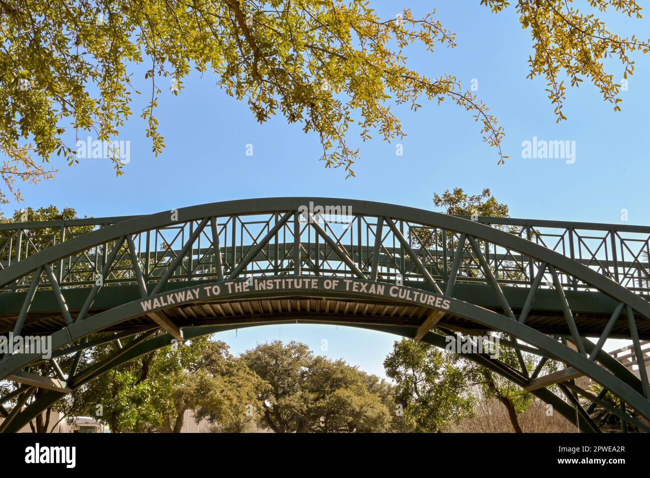 San Antonio, Texas, USA - February 2023: Footbridge at the entrance to the Institute of Texan Cultures at the Towers of the Americas park in San Anton Stock Photo