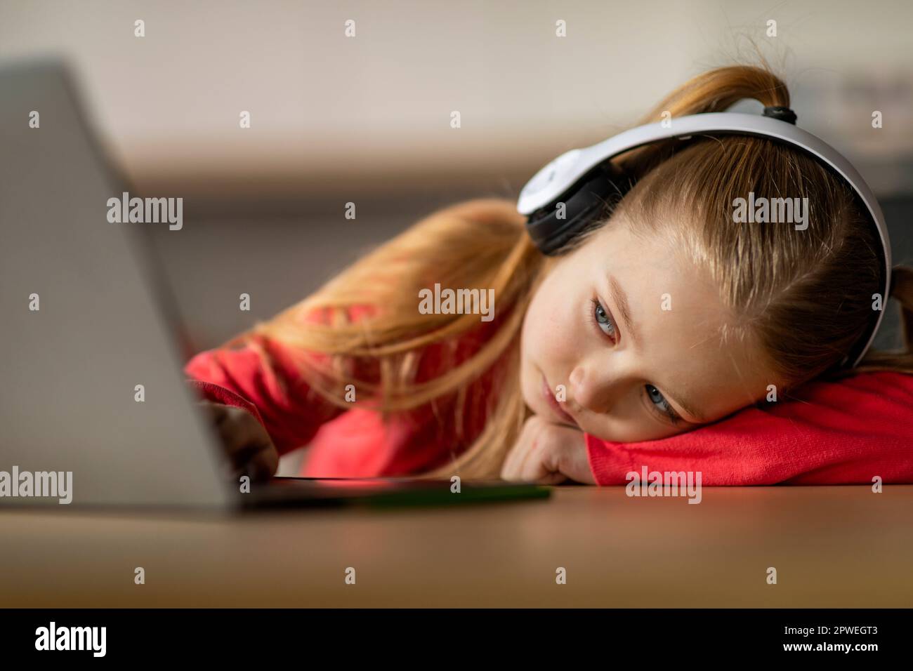Kid Crying At Computer Burnout In Children. Upset Little Girl Looking At Laptop Screen Stock ...