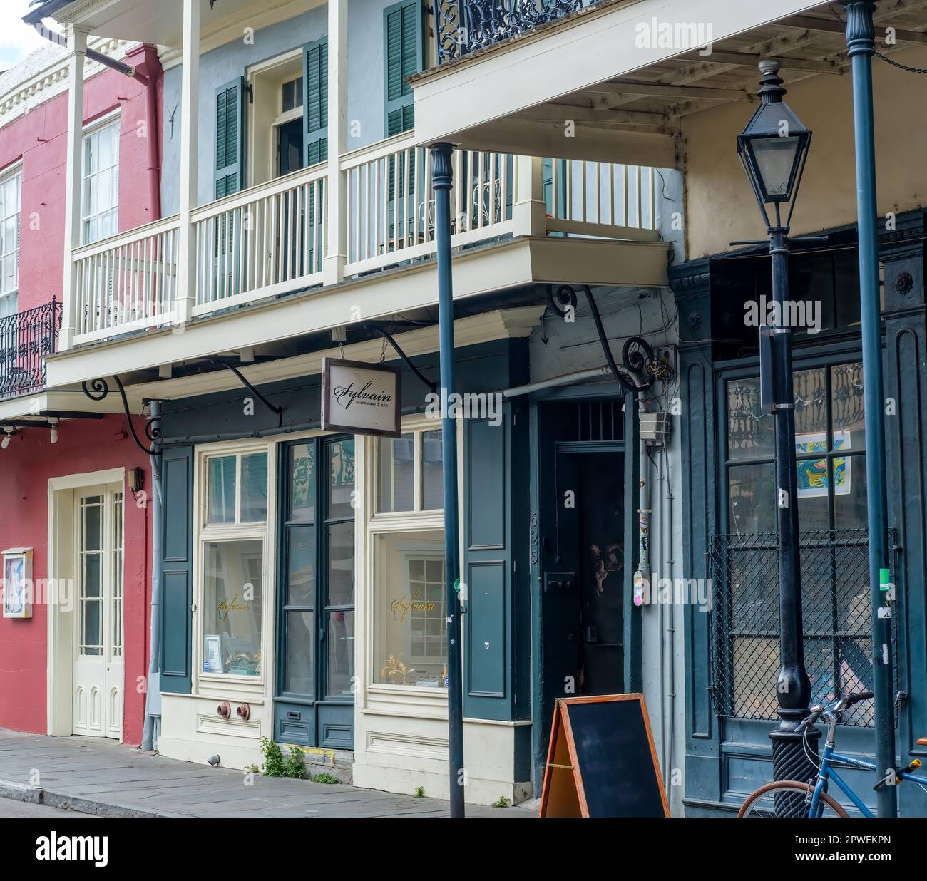 NEW ORLEANS, LA, USA - APRIL 23, 2023: Entrance to Sylvain Restaurant and Bar on Chartres Street in the French Quarter Stock Photo