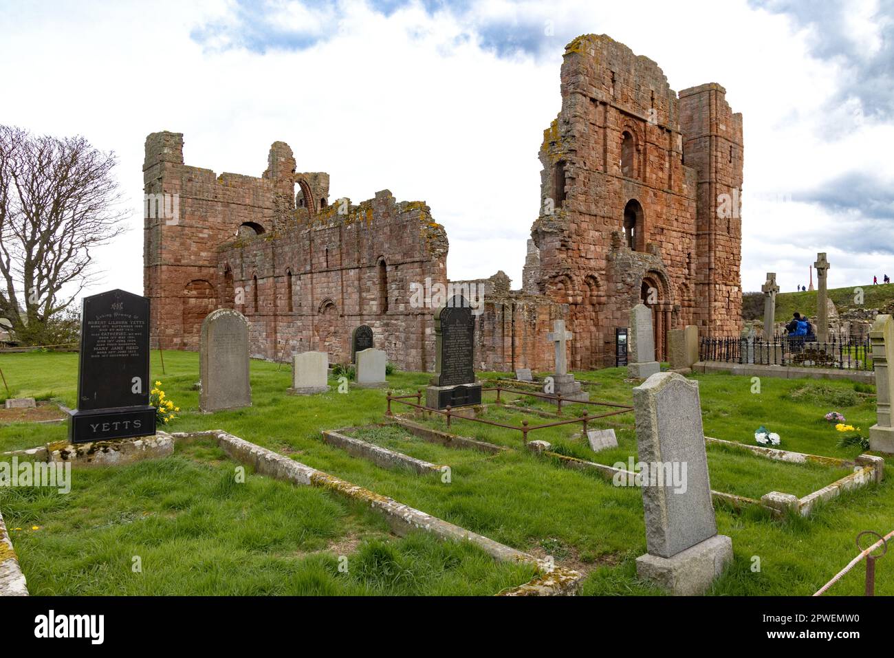 Lindisfarne Priory ruins; 7th century monastery associated with St Cuthbert and early christianity, on Lindisfarne or Holy Island Northumberland UK Stock Photo