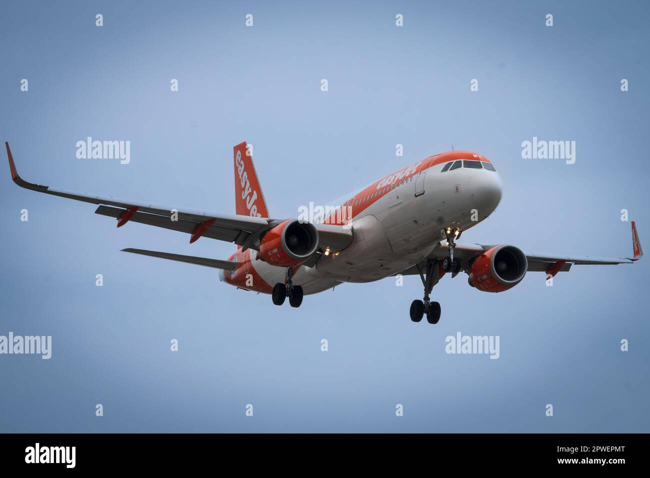 Easyjet Airbus A320-214 call sign G-EZWZ coming in to land. Stock Photo