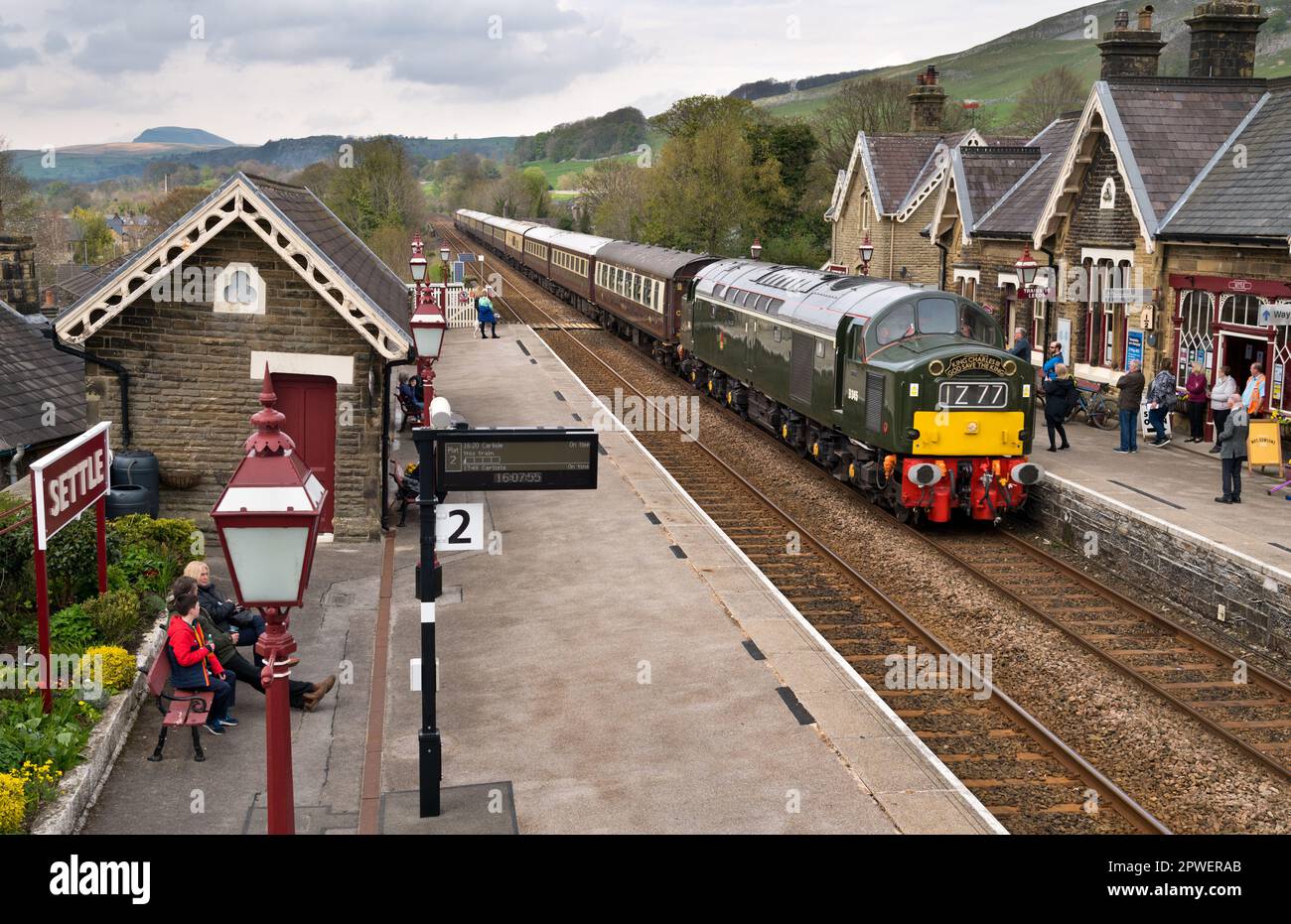 Class 40 vintage diesel D345 passes through Settle Station with 'The Northern Belle' special train, with Charles III Coronation headboards, 29th April. Stock Photo