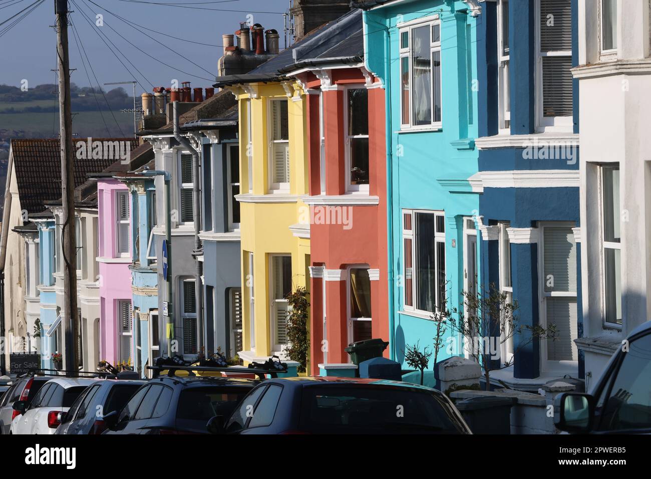A terrace of brightly painted houses in Brighton, UK Stock Photo