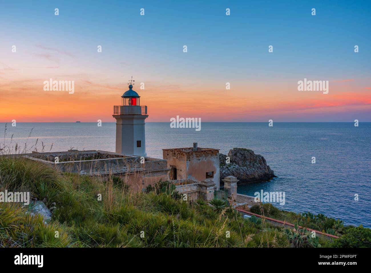 Capo Zafferano lighthouse at dusk, Sicily Stock Photo