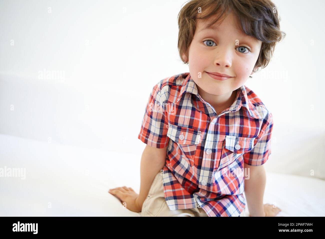 Let them be little. a cute little boy looking at the camera Stock Photo ...