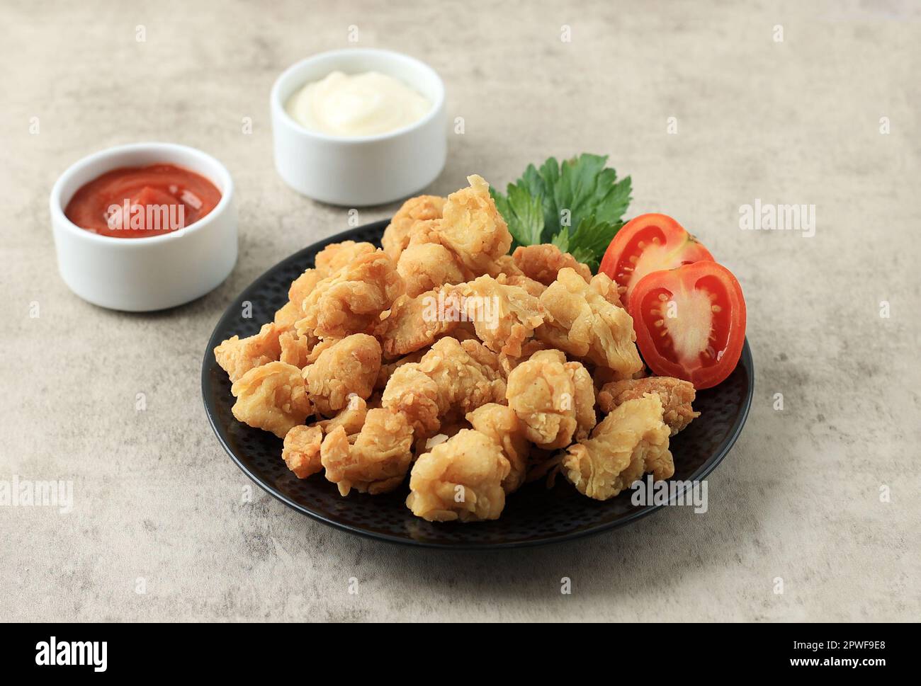 Homemade Chicken Popcorn with Chilli Sauce and Mayonaise. Slice Chicken