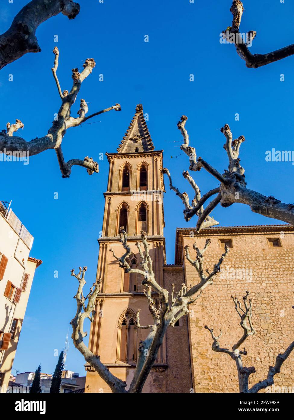 Bell tower of the Esglesia de Sant Bartomeu in the town of Soller in the Tramuntana Mountains of Majorca Spain Stock Photo