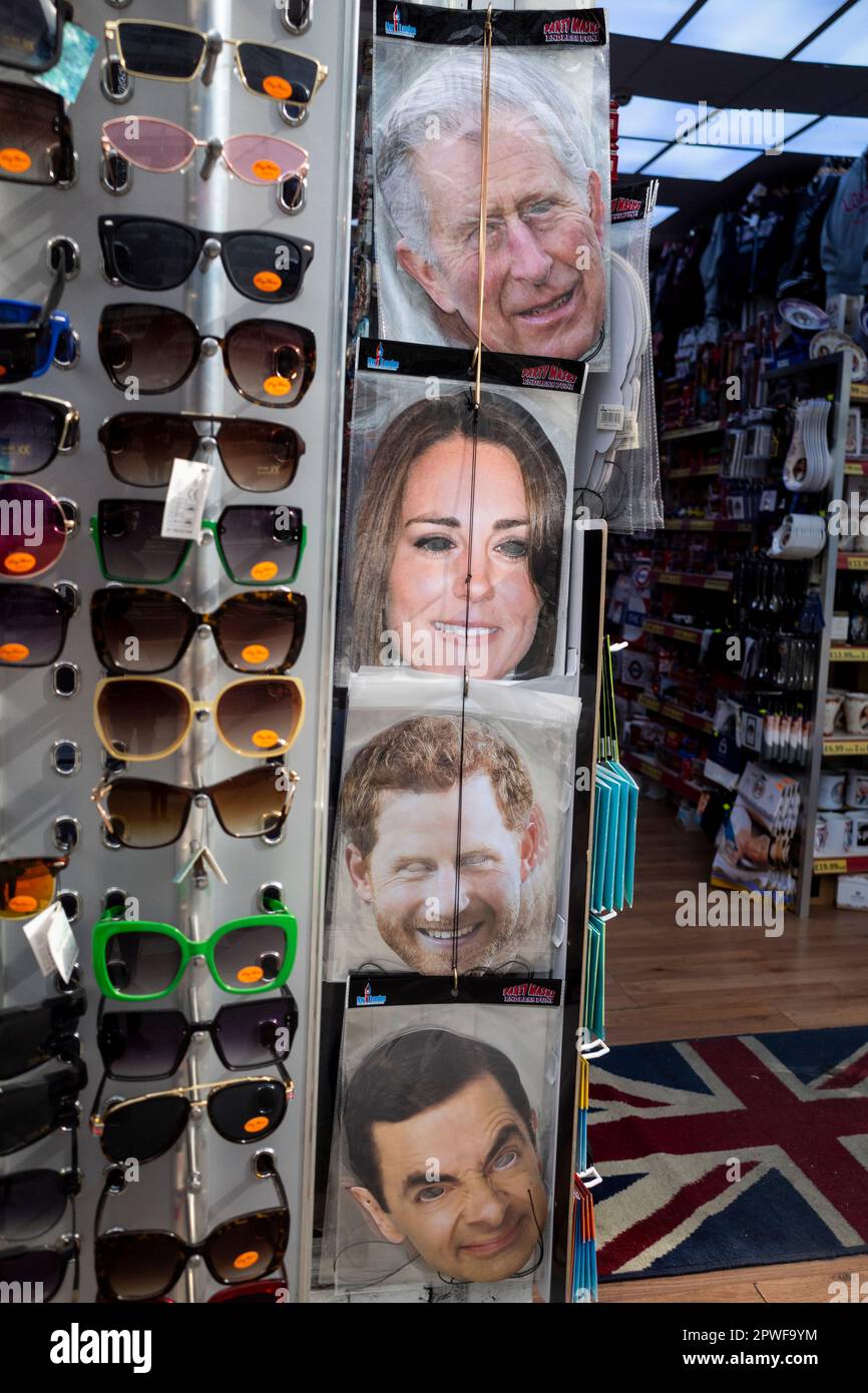 London, UK.  30 April 2023.  Royal memorabilia, including a King Charles, Princess of Wales and Prince Harry facemask, seen in the window of a souvenir shop in Paddington ahead of the coronation of King Charles III on 6 May.  Credit: Stephen Chung / Alamy Live News Stock Photo