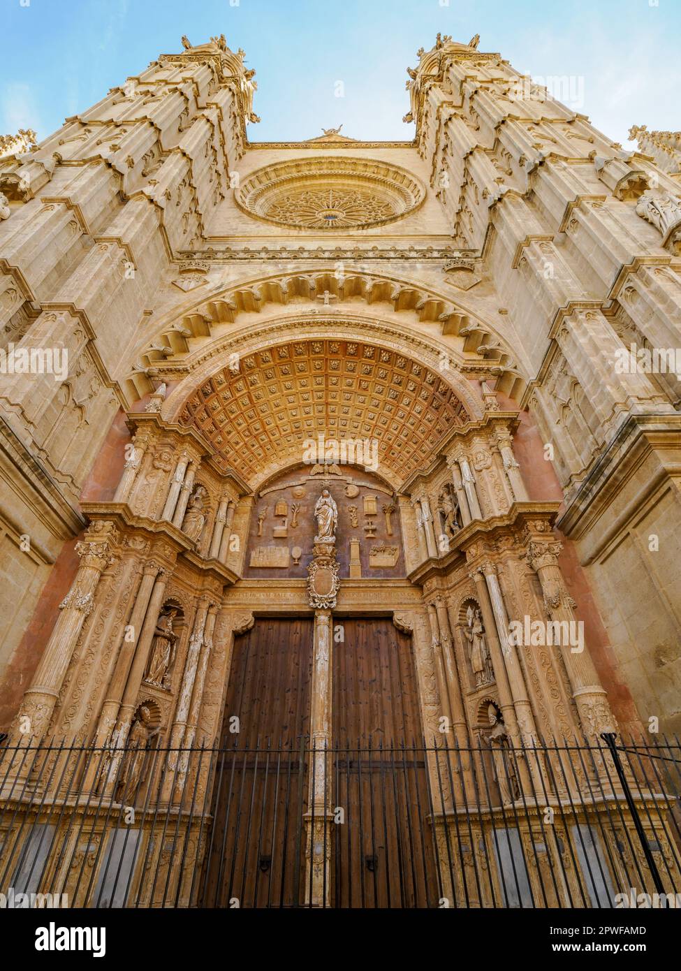 Looking up at the great entrance portal and rose window of the Cathedral of Santa Maria de Palma in Majorca Stock Photo