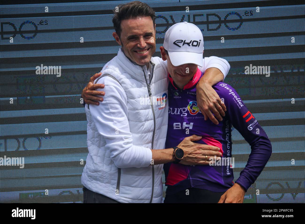 Oviedo, Spain, 30th April, 2023: Burgos-BH rider Pelayo Sanchez (R) is congratulated by Samuel Sanchez (L) during the 3rd stage of Vuelta a Asturias 2023 between Cangas del Narcea and Oviedo, on April 30 2023, in Oviedo, Spain. Credit: Alberto Brevers / Alamy Live News Stock Photo