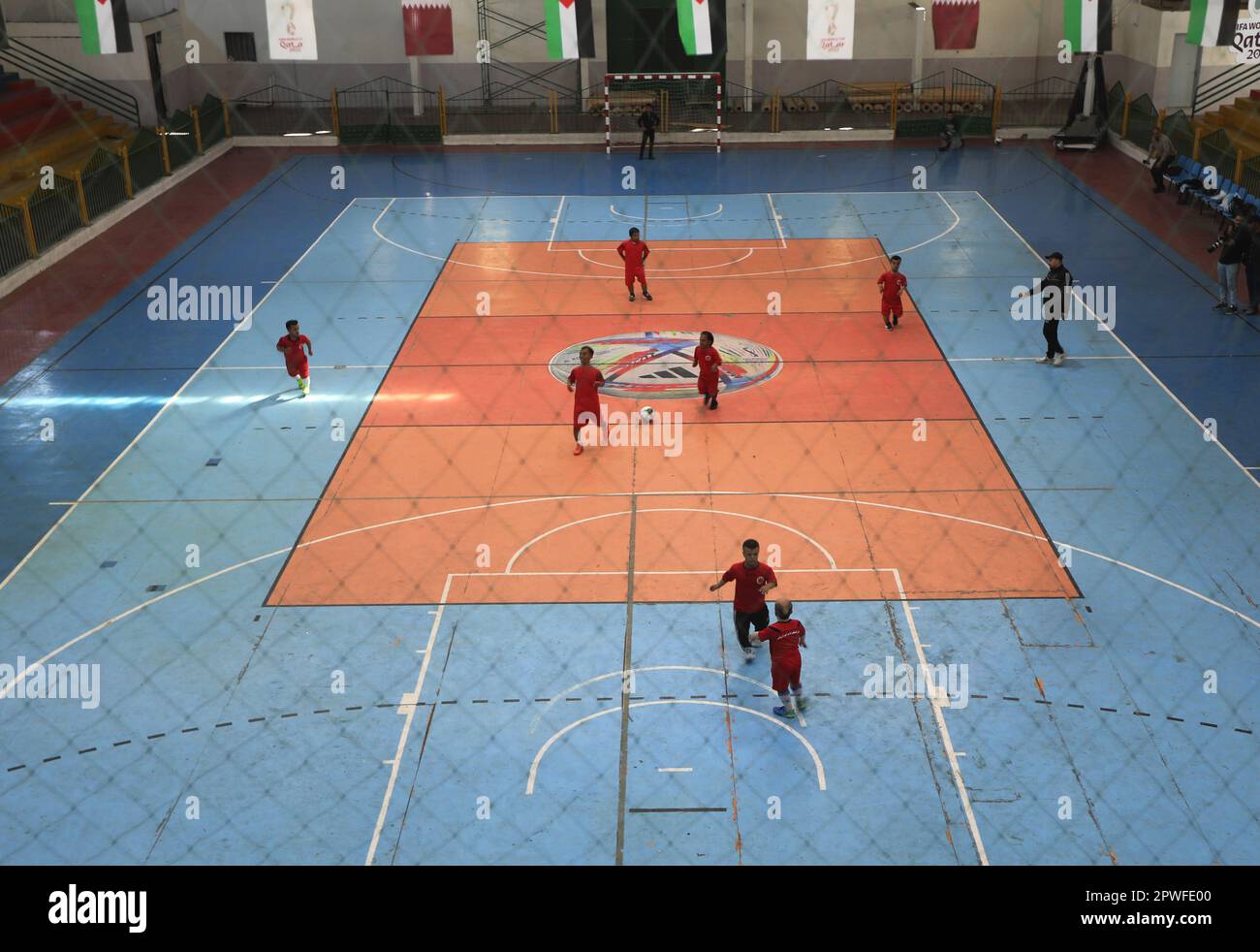 Gaza City, Gaza Strip, Palestine. 29th Apr, 2023. Gaza City, Palestine. 30 April 2023. A football team composed of players of short stature affected by skeletal dysplasia train and practice football in a gym in Gaza City. The team, which was recently set up in the Palestinian coastal enclave and is receiving intense training, is due to compete at international sports competitions (Credit Image: © Yousef Mohammed/IMAGESLIVE via ZUMA Press Wire) EDITORIAL USAGE ONLY! Not for Commercial USAGE! Stock Photo